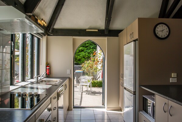 Lodge (4 Queen & 4 Single Beds) | Private kitchen | Fridge, microwave, stovetop, coffee/tea maker