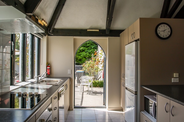 Lodge (4 Queen & 4 Single Beds) | Private kitchen | Fridge, microwave, stovetop, coffee/tea maker