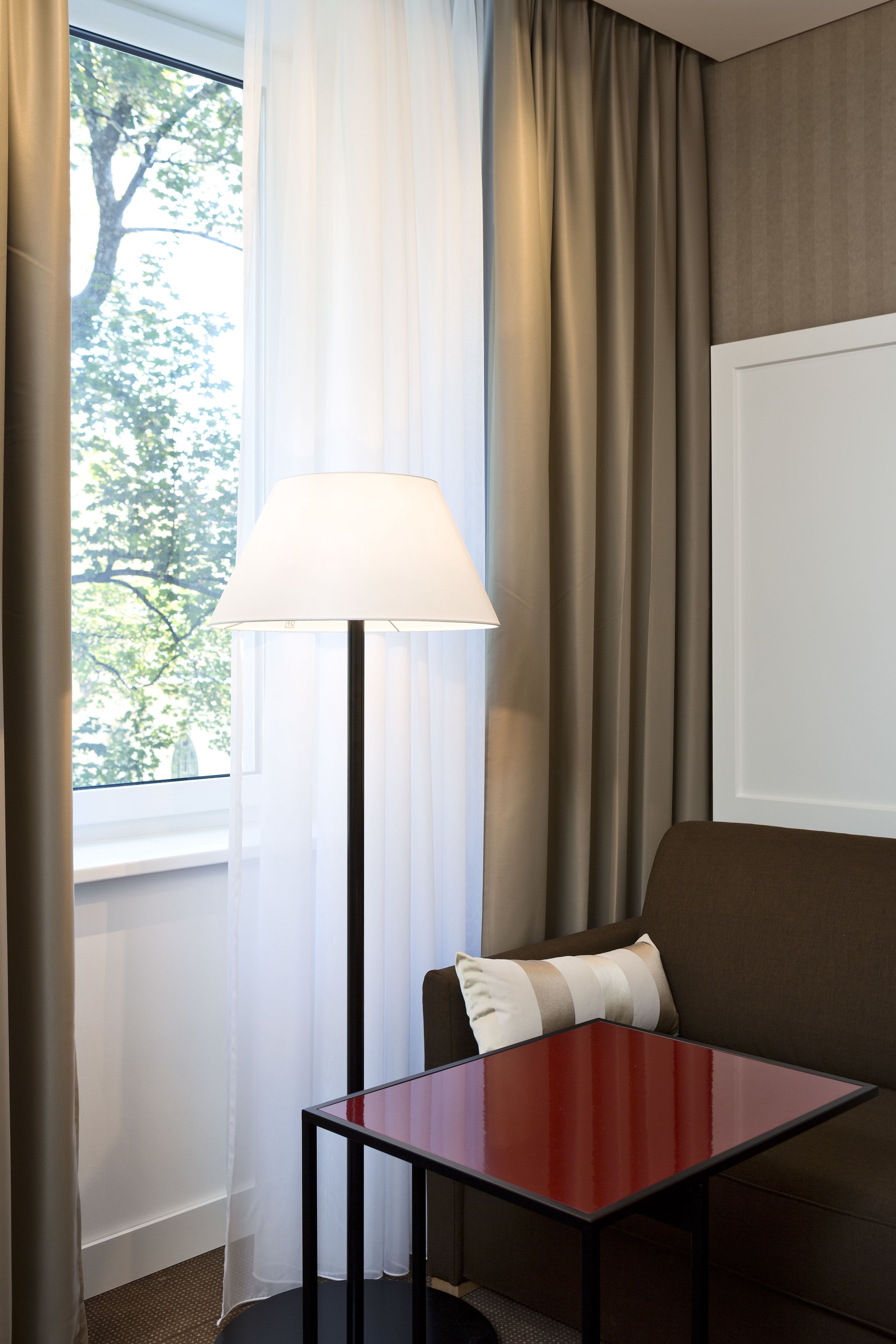 comfort room, 1 double bed, refrigerator | living area | flat-screen tv