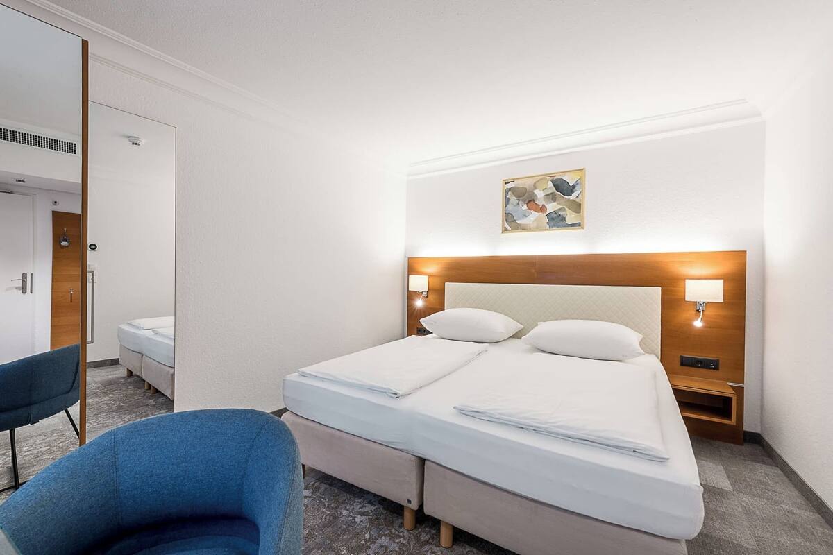 Hypo-allergenic bedding available, in-room safe, desk, laptop workspace