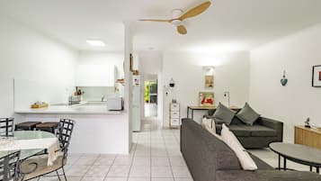 Family Suite, 1 Bedroom | Living area | 32-inch flat-screen TV with cable channels, TV, DVD player