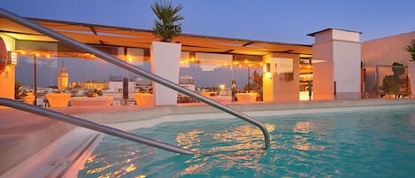 Seasonal outdoor pool, pool umbrellas, sun loungers