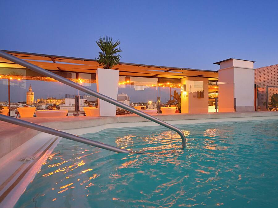 Seasonal outdoor pool, pool umbrellas, sun loungers