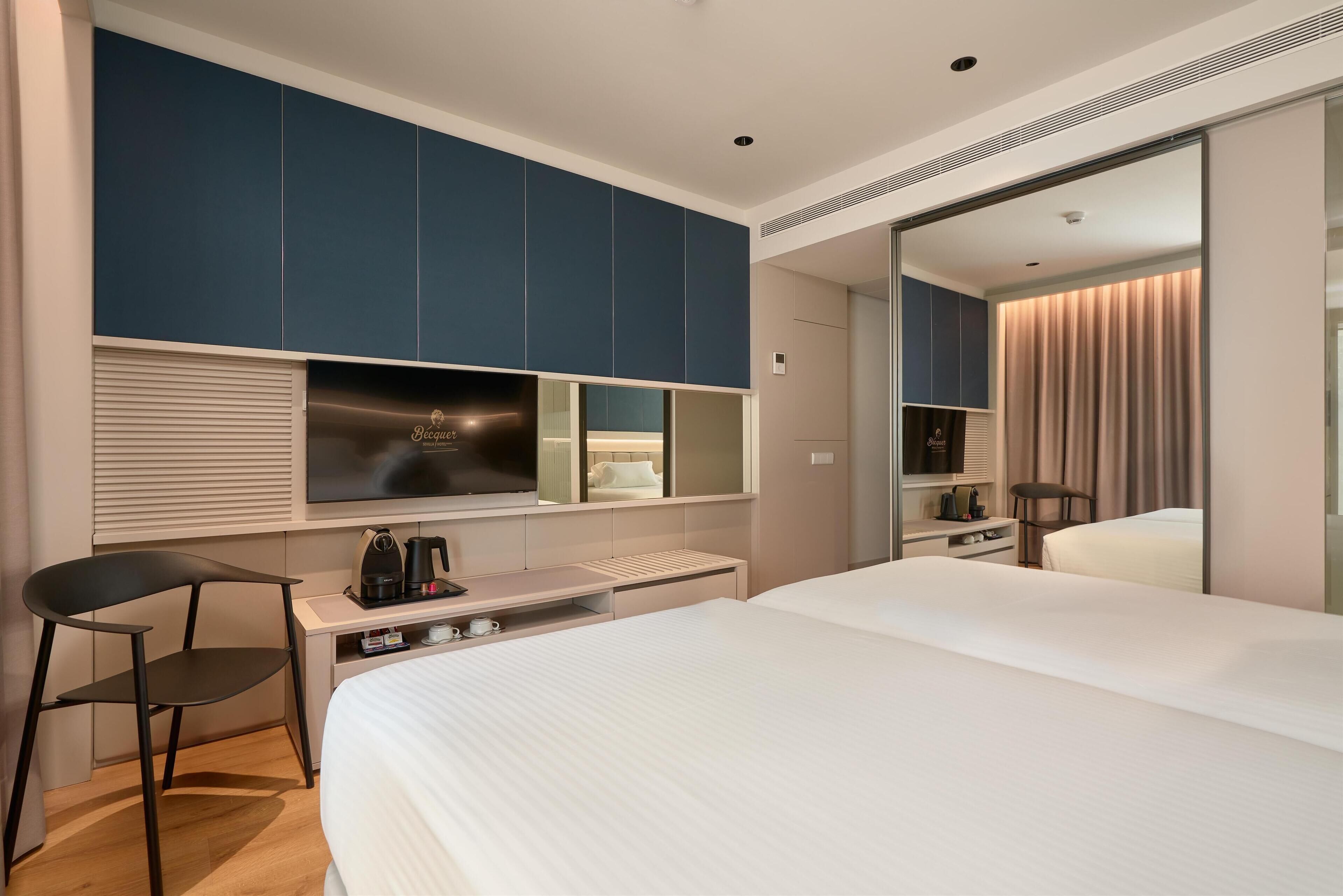 deluxe room, balcony | minibar, in-room safe, soundproofing, iron/ironing board