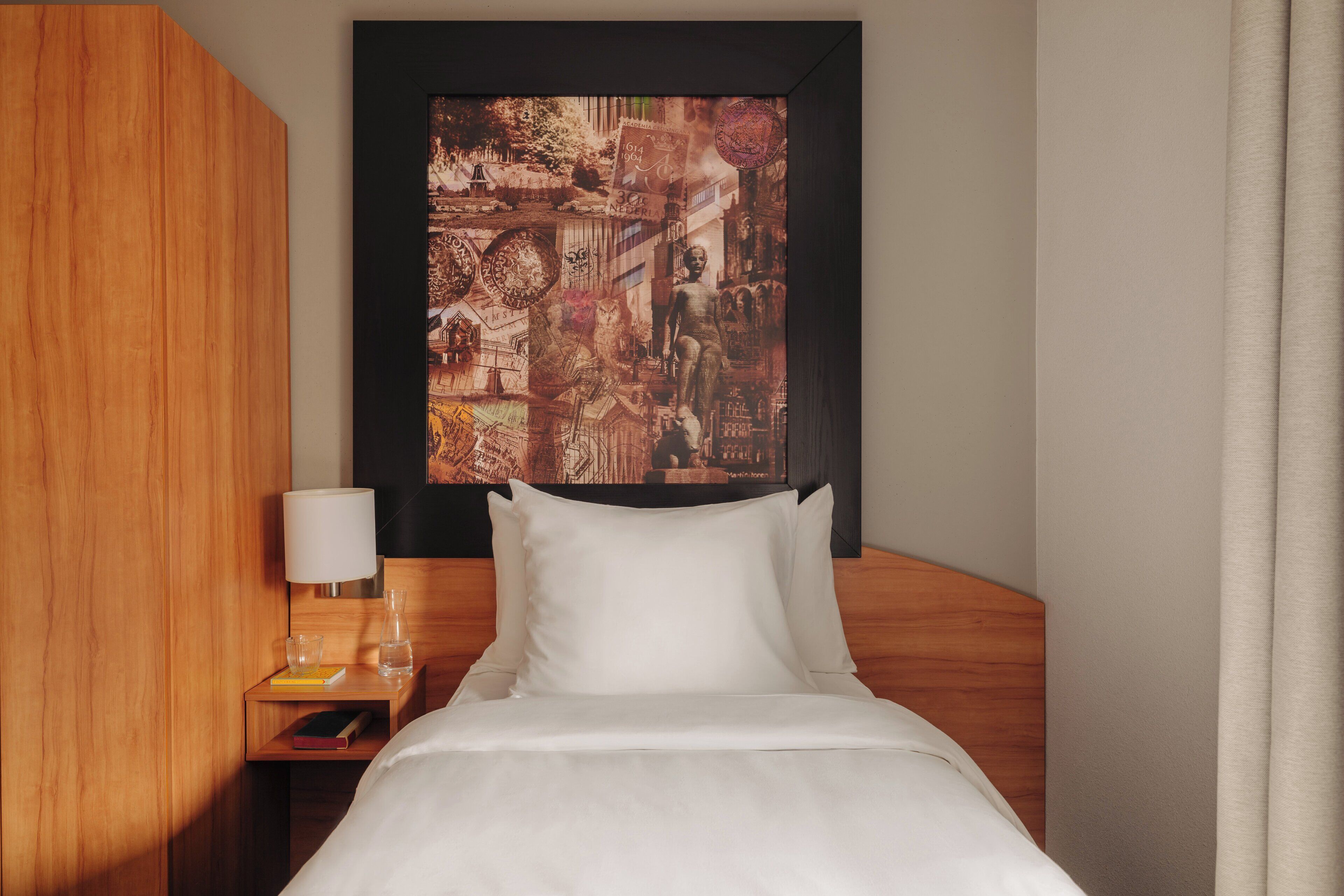 Habitación individual Confort | Ropa de cama de alta calidad, caja fuerte, escritorio