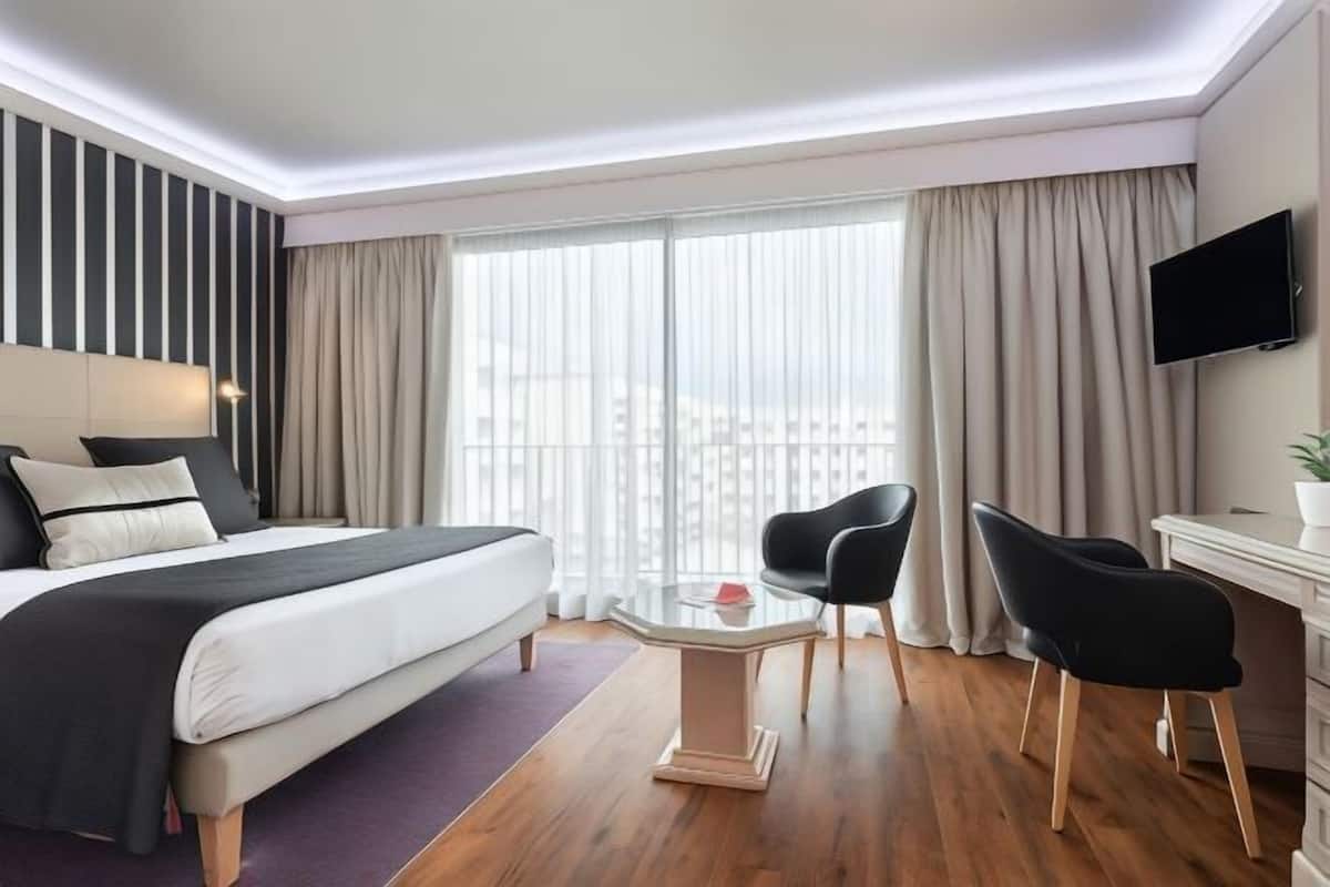 Premium bedding, desk, blackout curtains, soundproofing