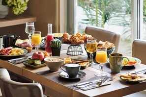 Daily buffet breakfast (EUR 14 per person)