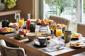 Daily buffet breakfast (EUR 14 per person)