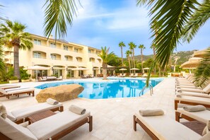 Seasonal outdoor pool, pool umbrellas, pool loungers