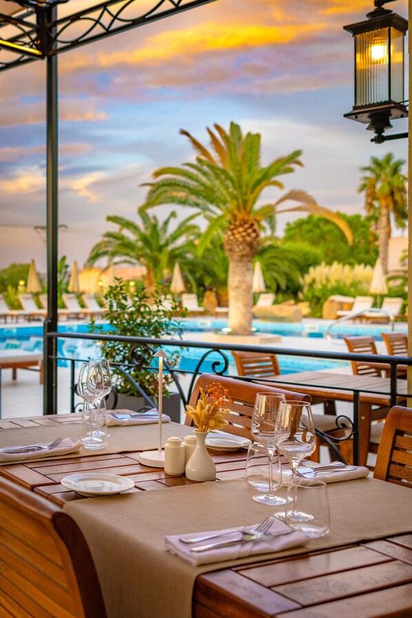 Seasonal outdoor pool, pool umbrellas, pool loungers