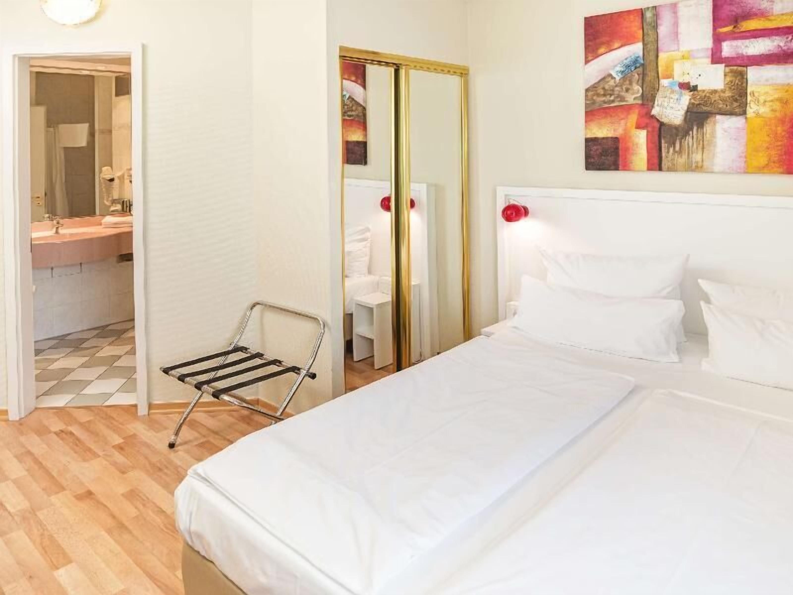 Desk, soundproofing, iron/ironing board, free cribs/infant beds