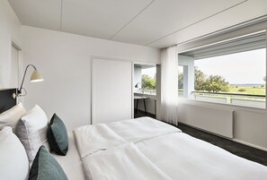 Suite | Premium bedding, individually decorated, desk, blackout drapes