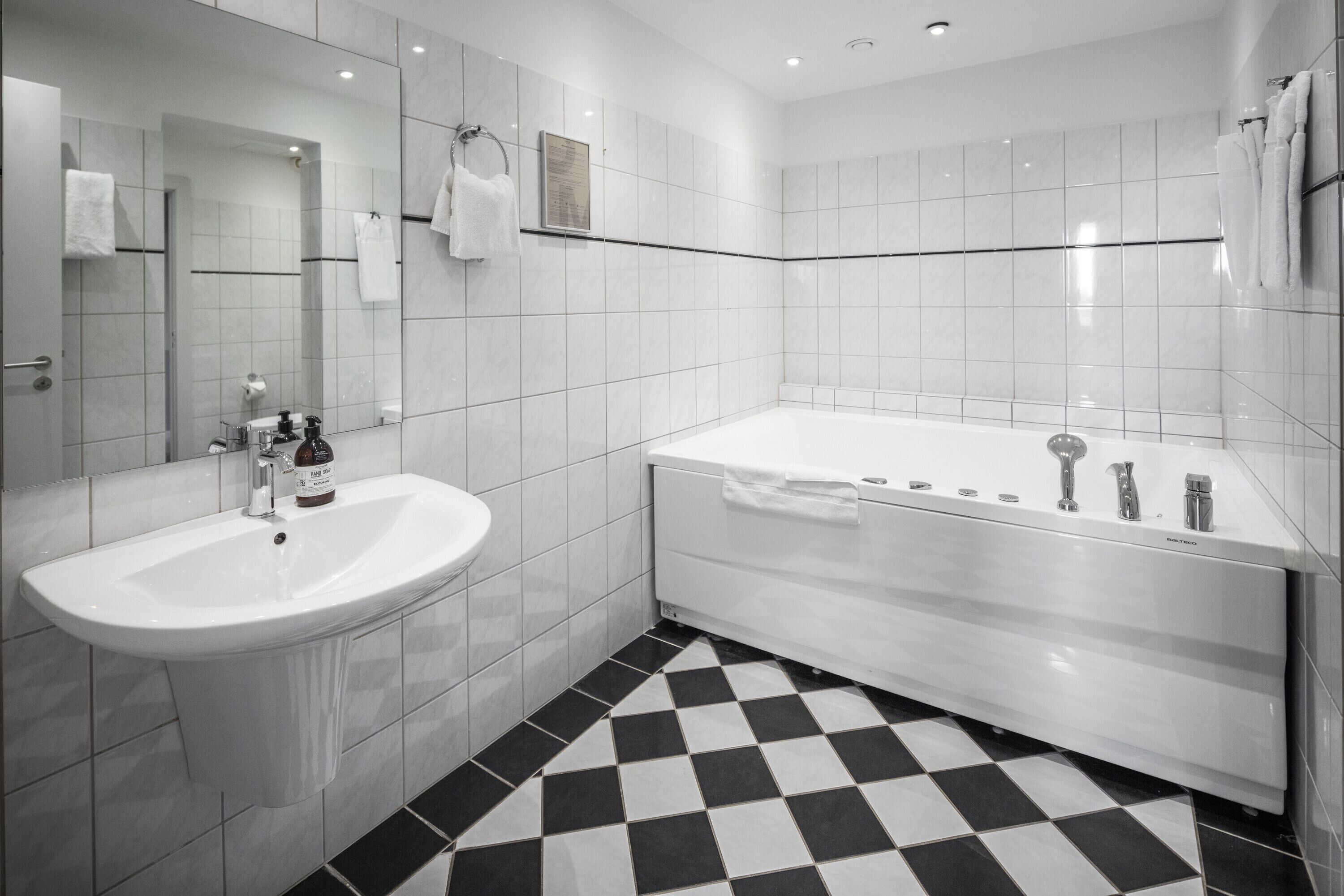 suite | bathroom | eco-friendly toiletries, hair dryer, towels