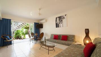 Two Bedroom Apartment | Living room | 30-inch LCD TV with digital channels, foosball, table tennis