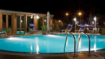 Indoor pool, outdoor pool, pool umbrellas, pool loungers