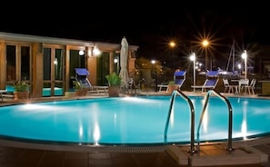 Indoor pool, outdoor pool, pool umbrellas, sun loungers