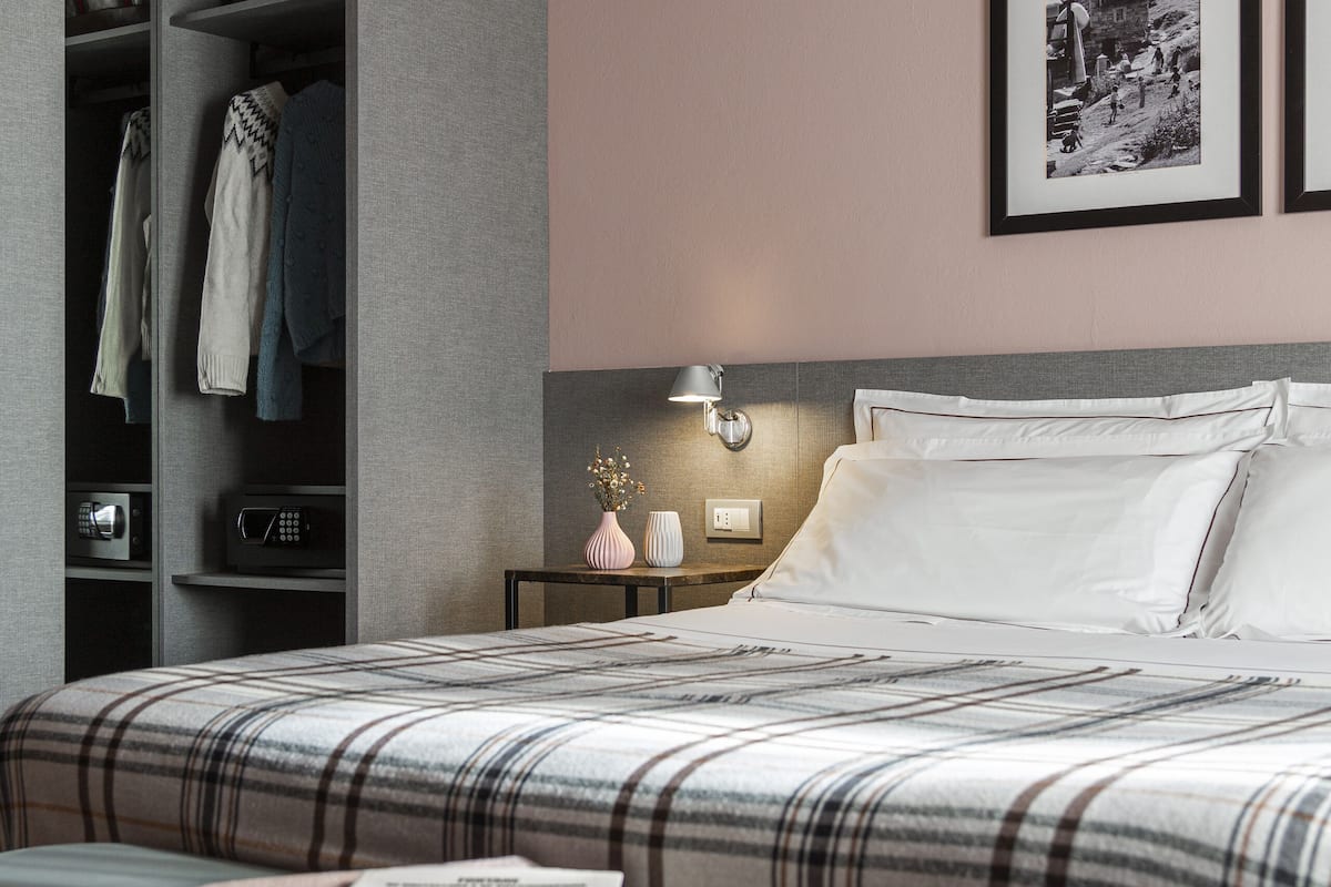 Junior Suite, Balcony | Egyptian cotton sheets, premium bedding, down comforters, in-room safe