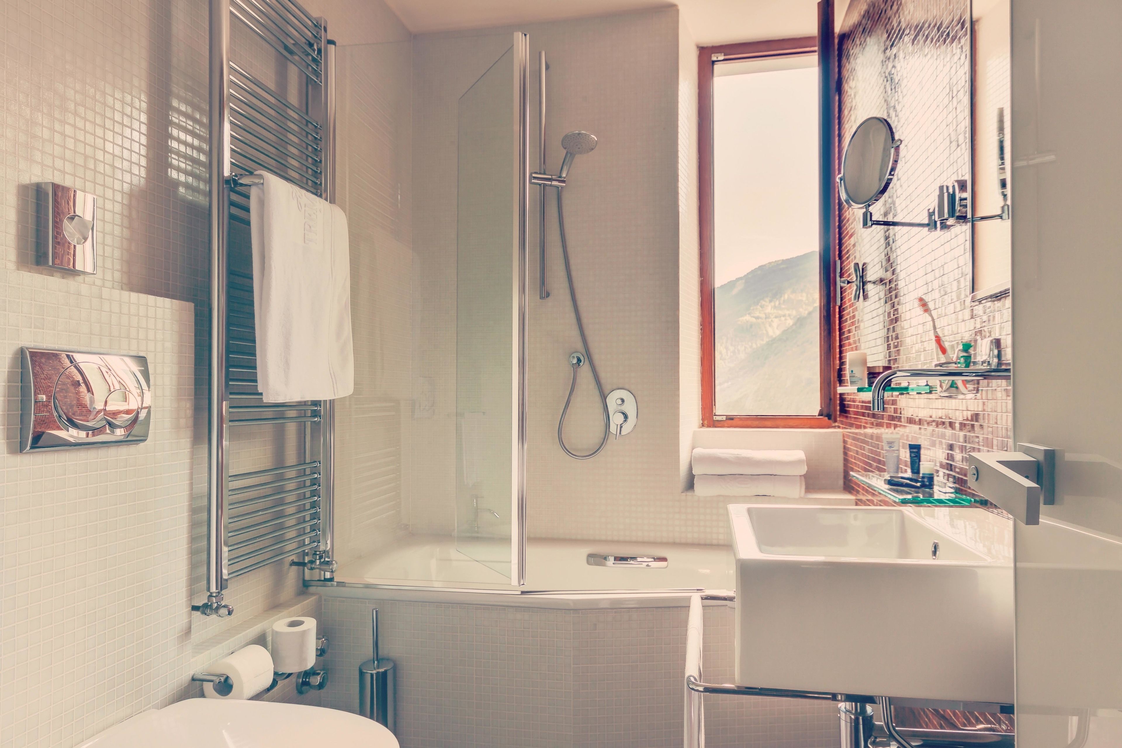 eco-friendly toiletries, hair dryer, towels