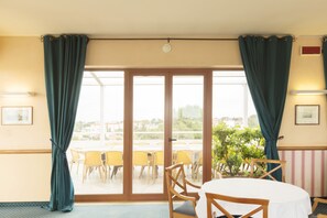 Relax on the patio with a round table and comfortable seating.