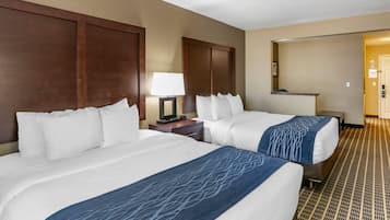 Premium bedding, laptop workspace, blackout curtains, soundproofing