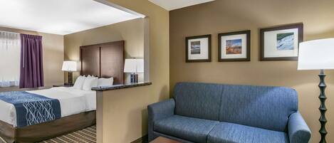 Premium bedding, laptop workspace, blackout drapes, soundproofing