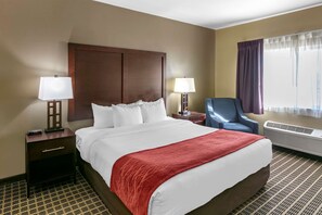 Premium bedding, laptop workspace, blackout curtains, soundproofing