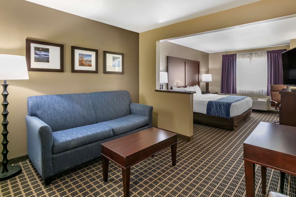 Premium bedding, laptop workspace, blackout drapes, soundproofing
