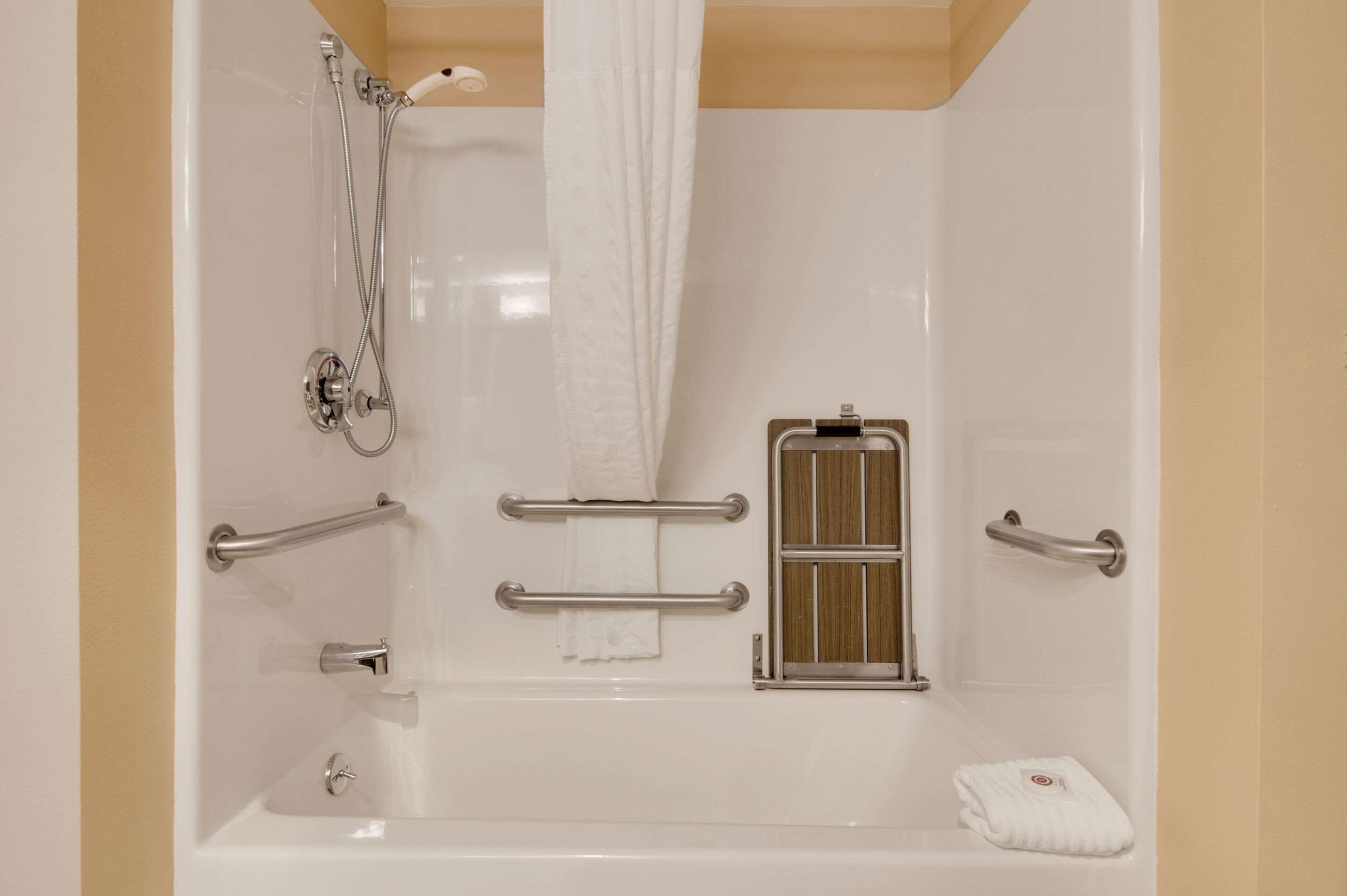 combined shower/bathtub, free toiletries, hair dryer, towels