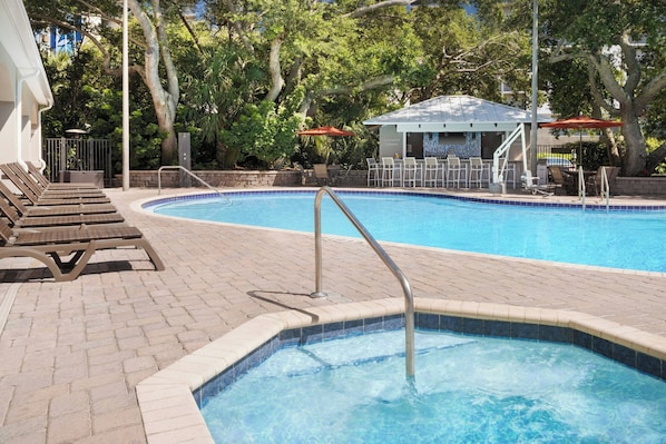 Outdoor pool, open 9:00 AM to 11:00 PM, pool umbrellas, pool loungers