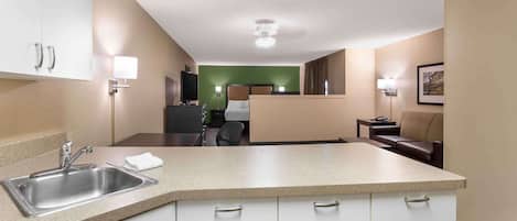 Full-size fridge, microwave, stovetop, coffee/tea maker