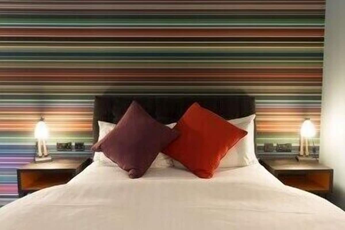 Desk, laptop workspace, blackout curtains, iron/ironing board