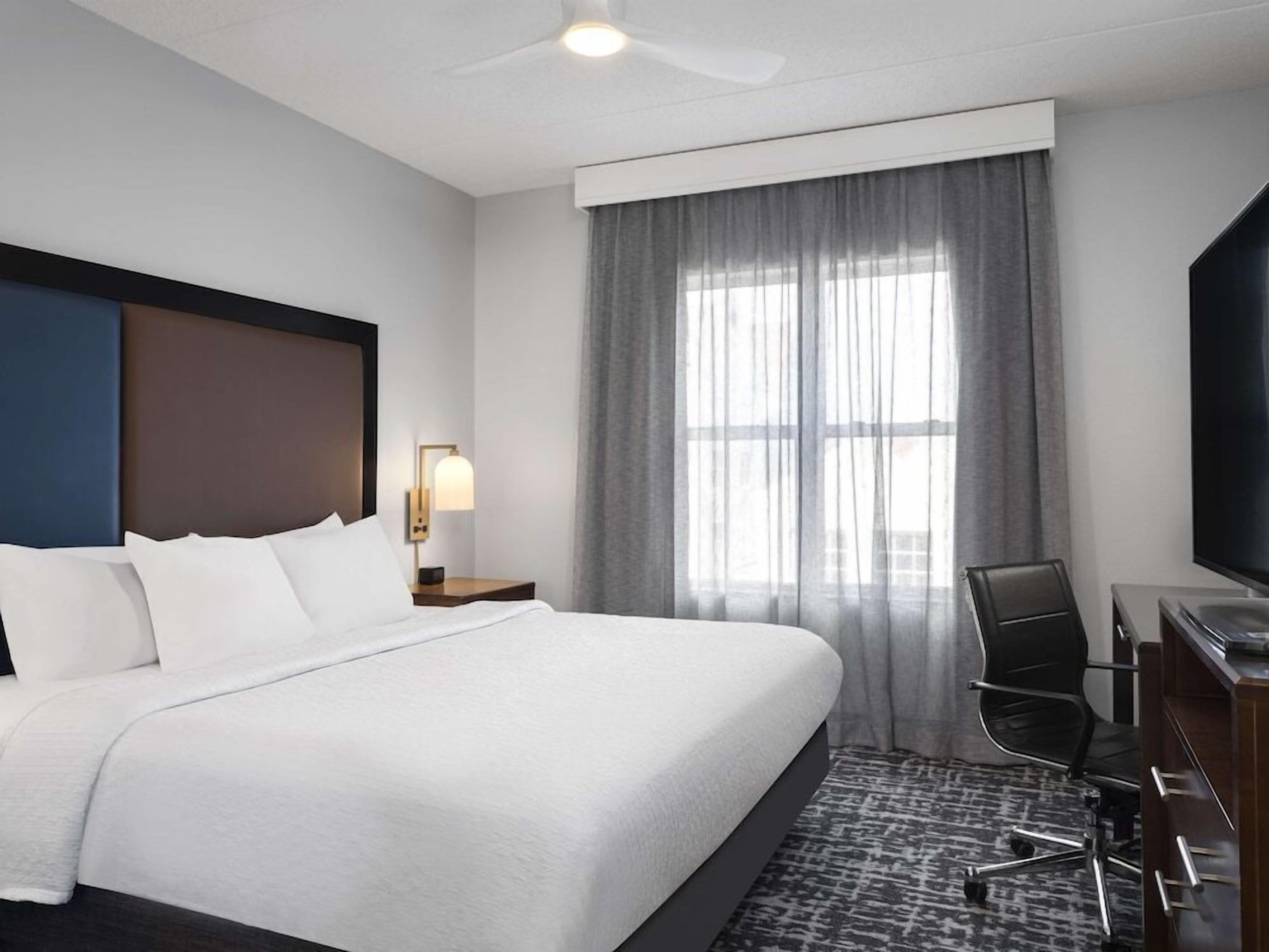 Down duvets, pillow-top beds, in-room safe, desk
