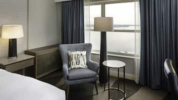 Room, 1 King Bed, Jetted Tub | Living area | 55-inch LCD TV with cable channels, TV