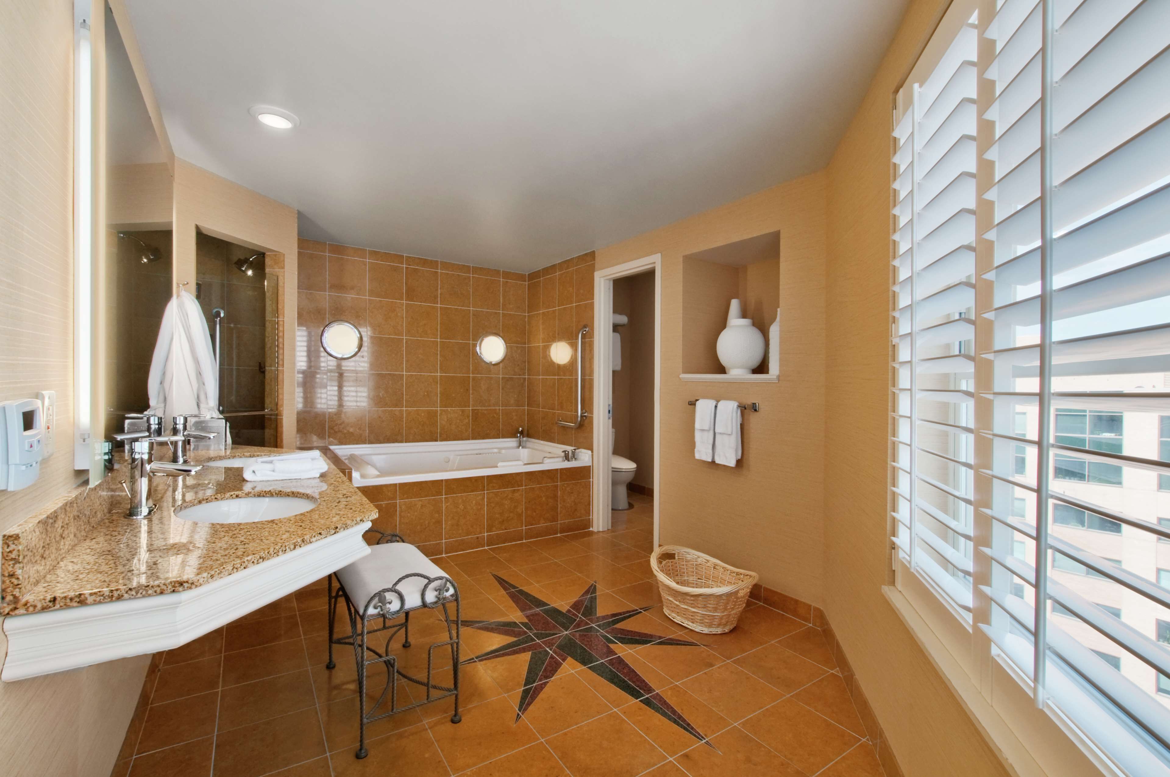room, 1 king bed, jetted tub | bathroom | combined shower/bathtub, free toiletries, hair dryer, towels