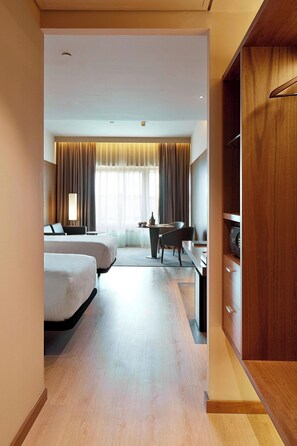 Egyptian cotton sheets, down comforters, memory foam beds, minibar