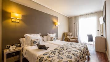 Premium bedding, down duvets, minibar, in-room safe