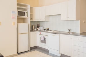 2 Bedroom Apartment | Private kitchen | Microwave, coffee/tea maker, electric kettle