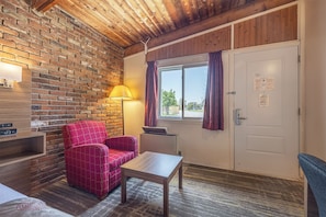 Premium bedding, desk, laptop workspace, blackout curtains