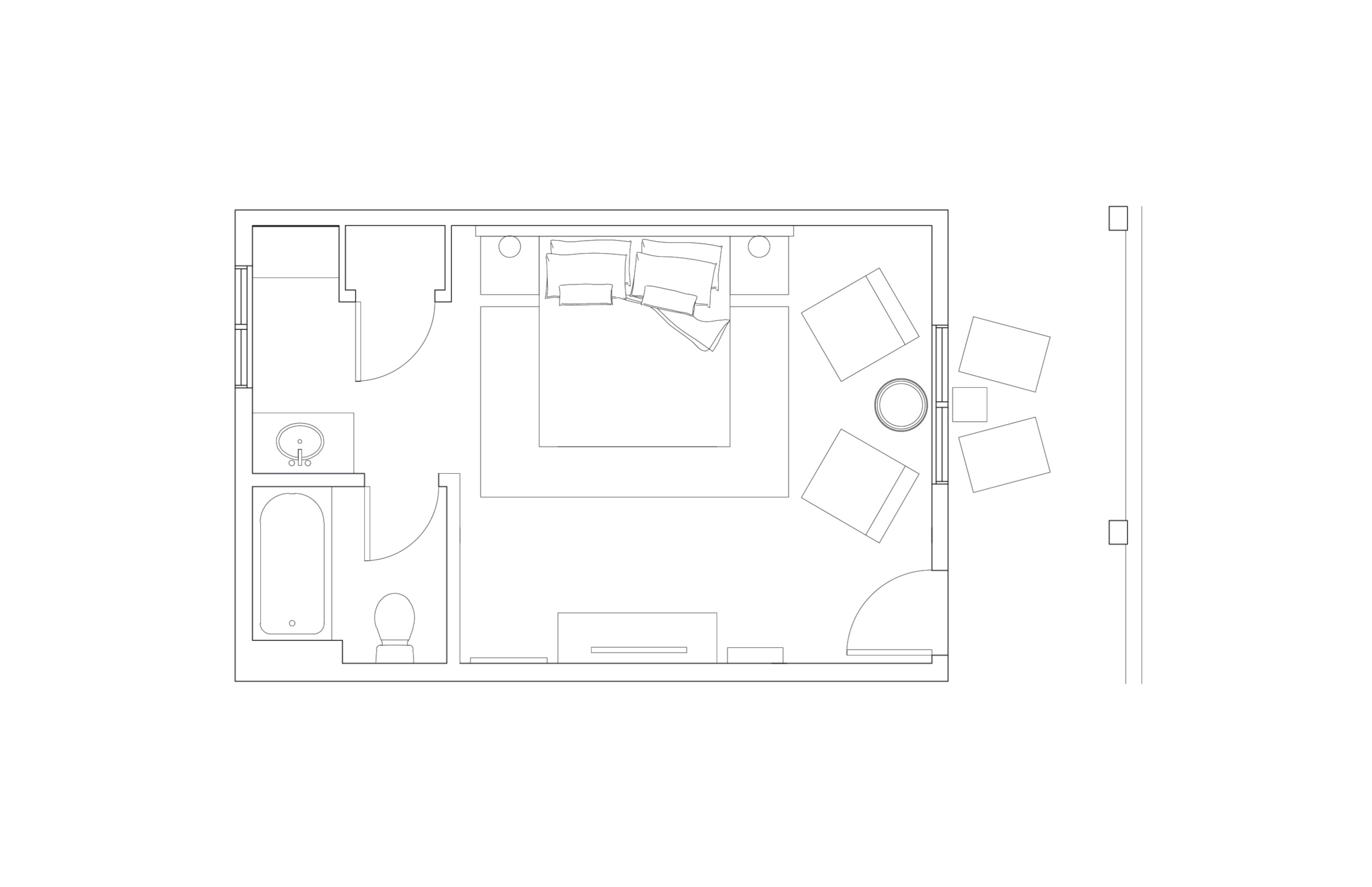 Plano de un cuarto de hotel que incluye baño, cama, escritorio y un pequeño espacio para sentarse.