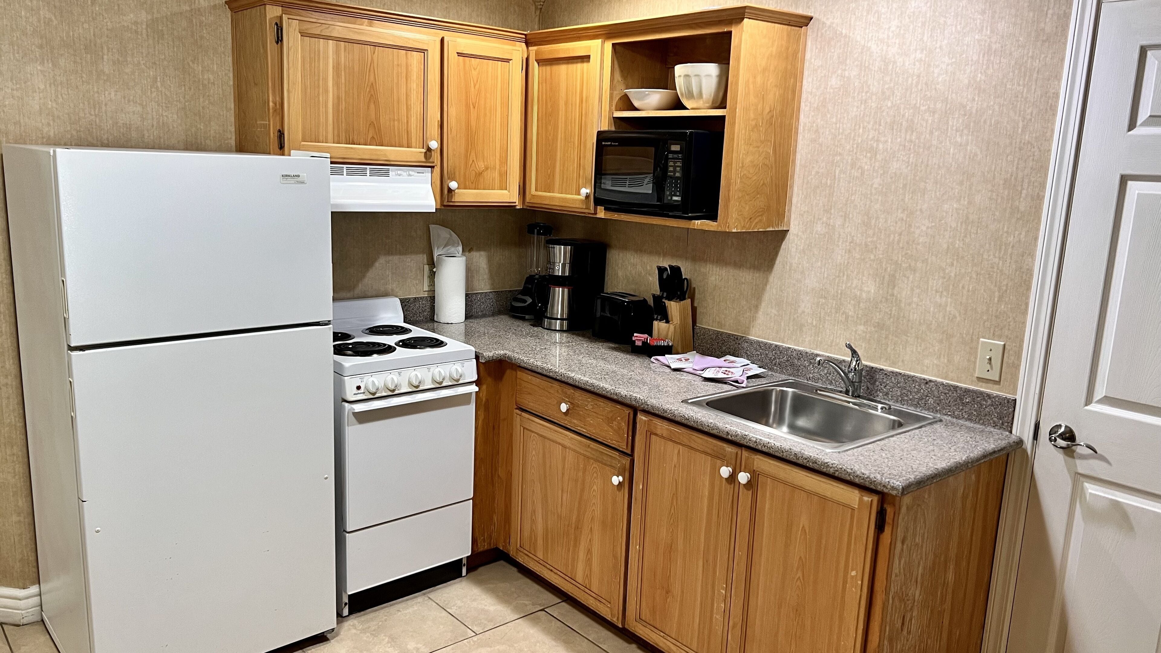 deluxe river view 2 bedroom family suite  | private kitchen | fridge, microwave, coffee/tea maker, toaster