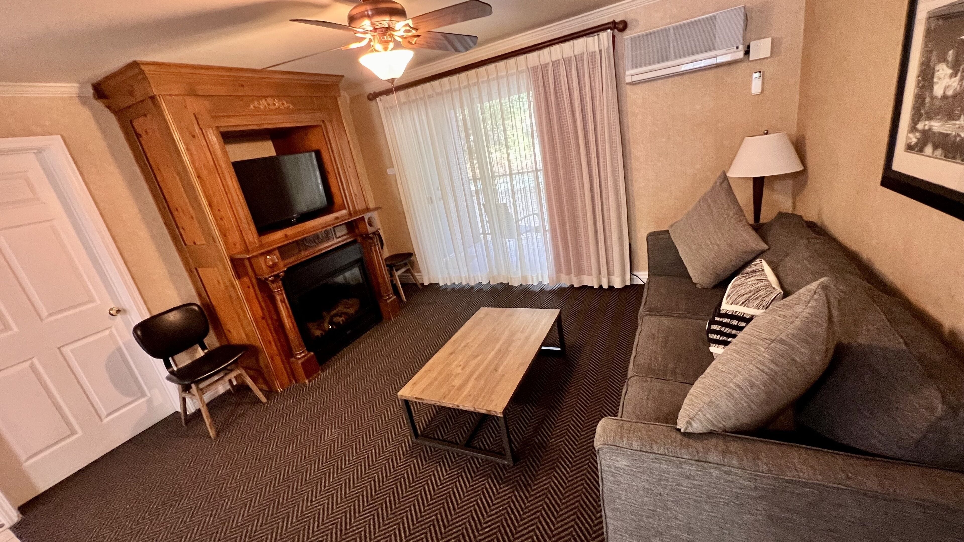 deluxe river view 2 bedroom family suite  | living area | 32-inch tv with cable channels