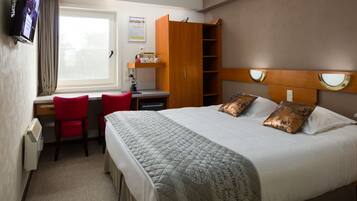 Free minibar items, desk, laptop workspace, blackout curtains