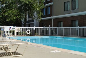 Seasonal outdoor pool, pool loungers