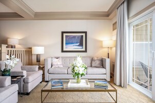 Room, 1 King Bed (Premier Bay View Suite) | Living area | Flat-screen TV, fireplace, DVD player