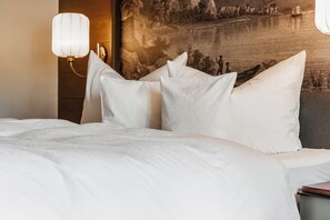 Ropa de cama hipoalergénica, minibar y escritorio 