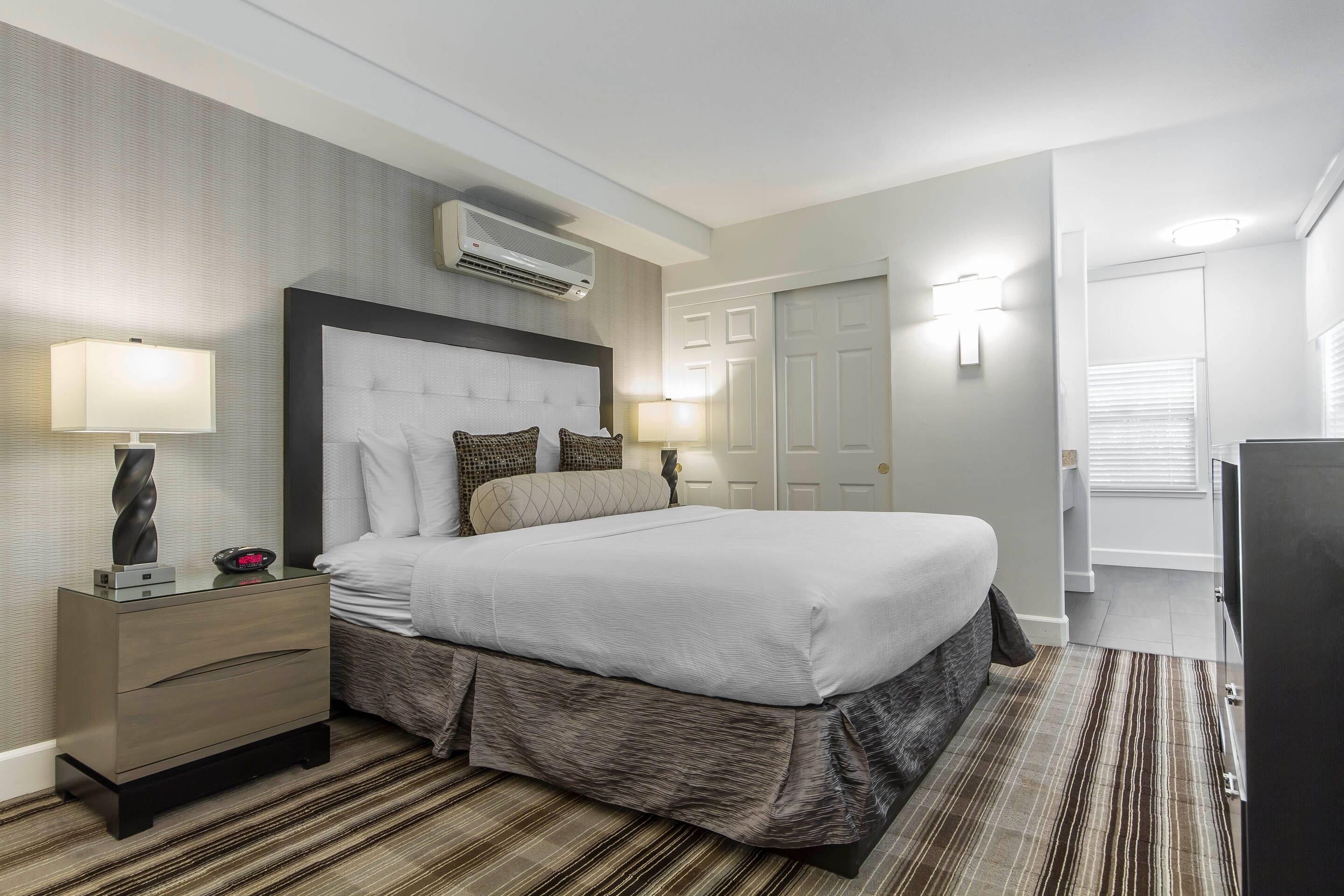 premium bedding, pillow-top beds, desk, laptop workspace