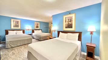 Habitación estándar, varias camas, para no fumadores | Tabla de planchar con plancha, camas extra y wifi gratis