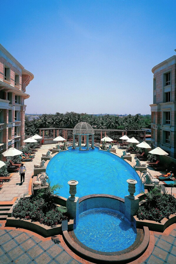 Outdoor pool, open 6:00 AM to 8:00 PM, pool umbrellas, sun loungers