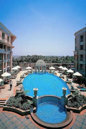 Outdoor pool, open 6:00 AM to 8:00 PM, pool umbrellas, sun loungers