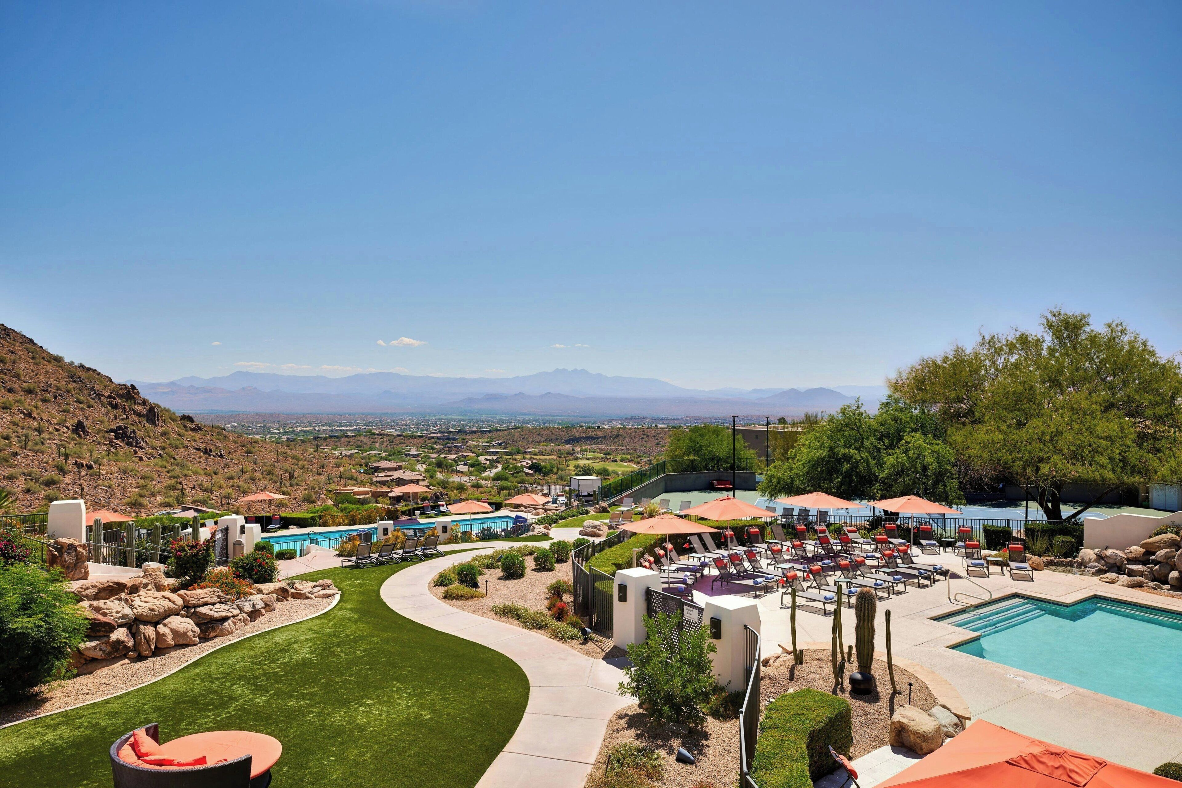 2 outdoor pools, open 6:00 am to 10:00 pm, pool umbrellas, pool loungers